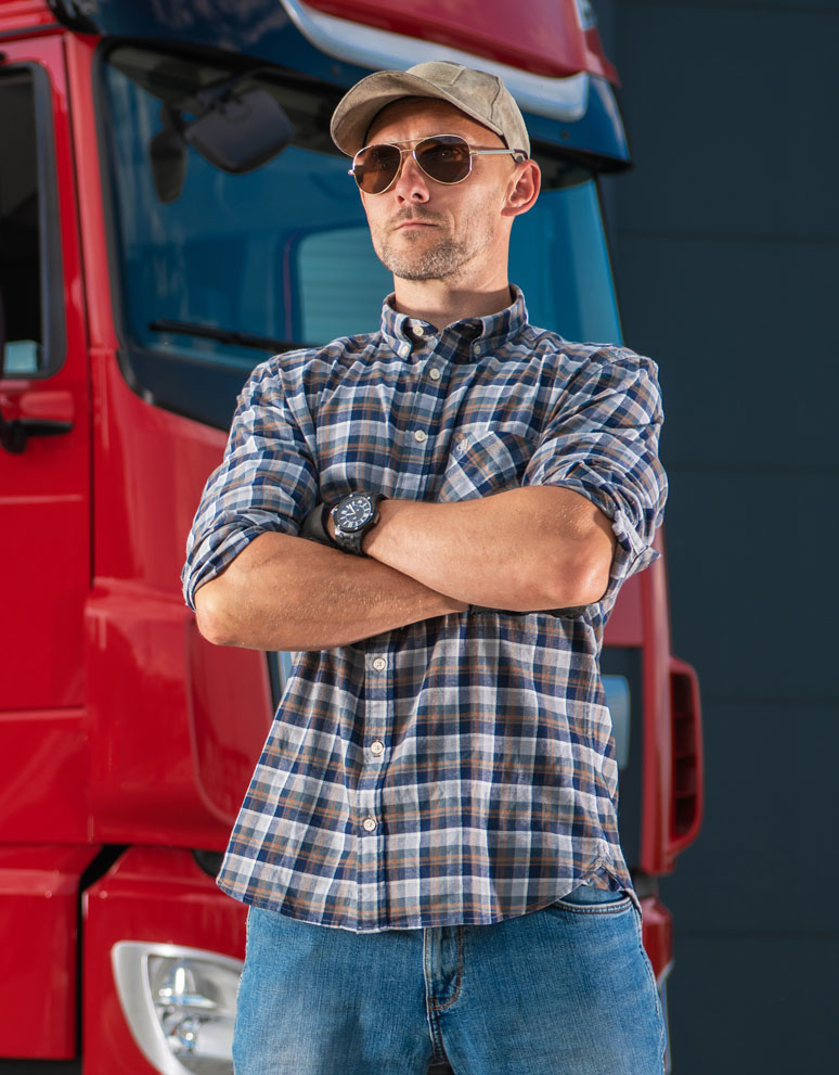 professional semi truck driver and his heavy duty R4VNXWX